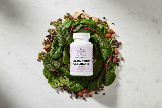 Organic Pharmer Magnesium Glycinate capsules with magnesium-rich whole foods including spinach, pumpkin seeds, almonds and cacao — chelated magnesium for superior absorption and daily wellness support